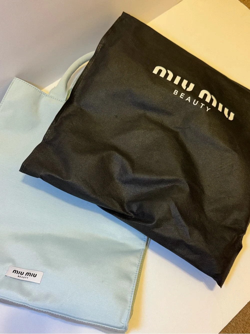 Miu Miu Beauty bag with black dust bag